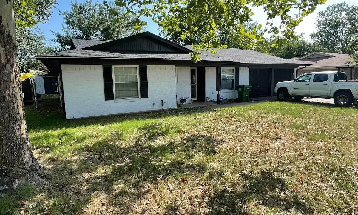 Professional roofing crew working on a residential roof in Milford Mill